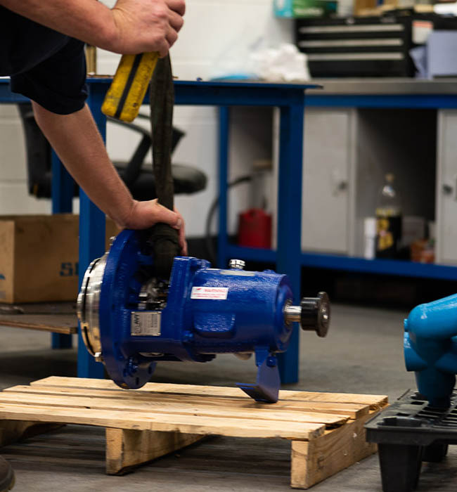 Pump on a pallet waiting to be repaired