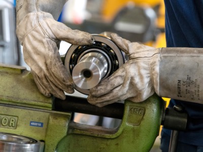 man working on a pump